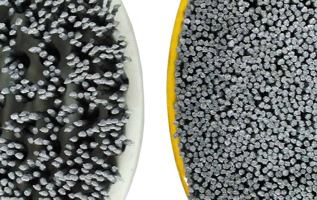 Confronto tra una innovativa spazzola ATB ad alta densità e una spazzola convenzionale ottenuta per punzonatura